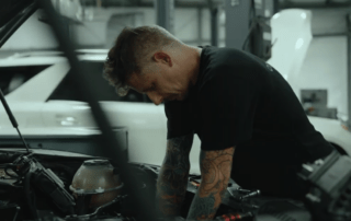 tech working on car