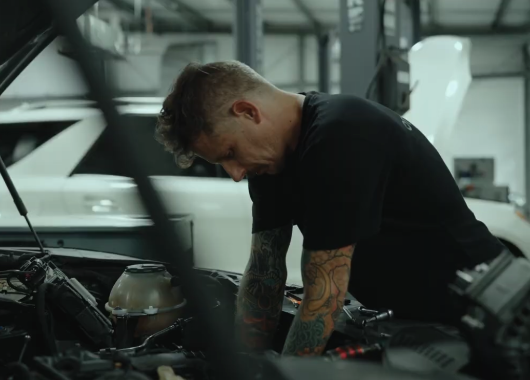 tech working on car